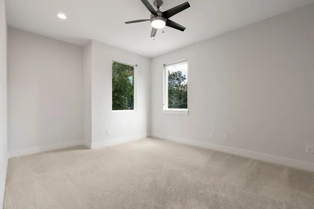a living room with furniture and window