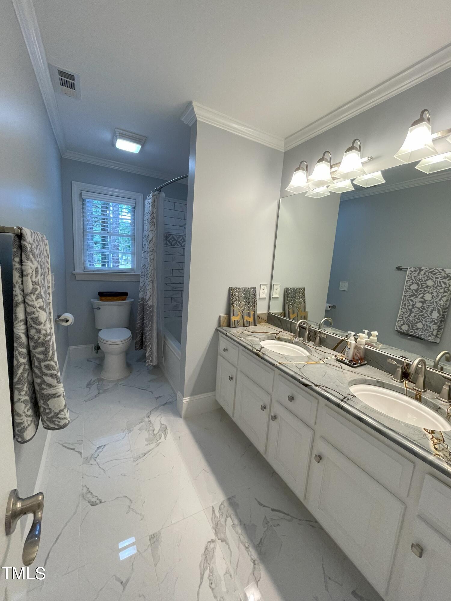 3033 Pearces Road Zebulon, NC 27597 - Photo 32 of 42 35_Bathroom_upstairs hallway