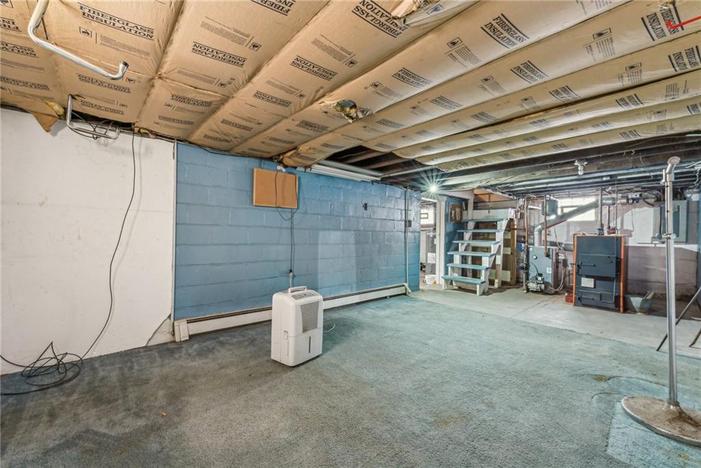 711 Pleasant Valley Road Connellsville, PA 15425 - Photo 23 of 46 a view of a room with gym equipment