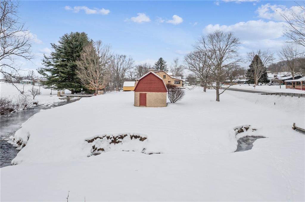 711 Pleasant Valley Road Connellsville, PA 15425 - Photo 33 of 46 a view of a wooden floor and a snow in the background