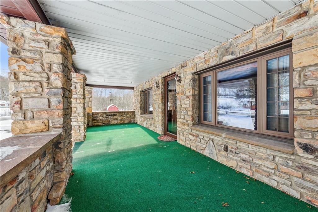 711 Pleasant Valley Road Connellsville, PA 15425 - Photo 5 of 46 a view of an house with backyard porch and furniture