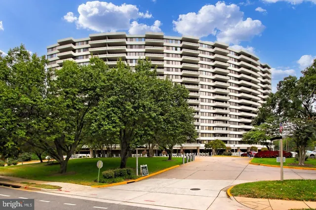 a view of a building with a yard