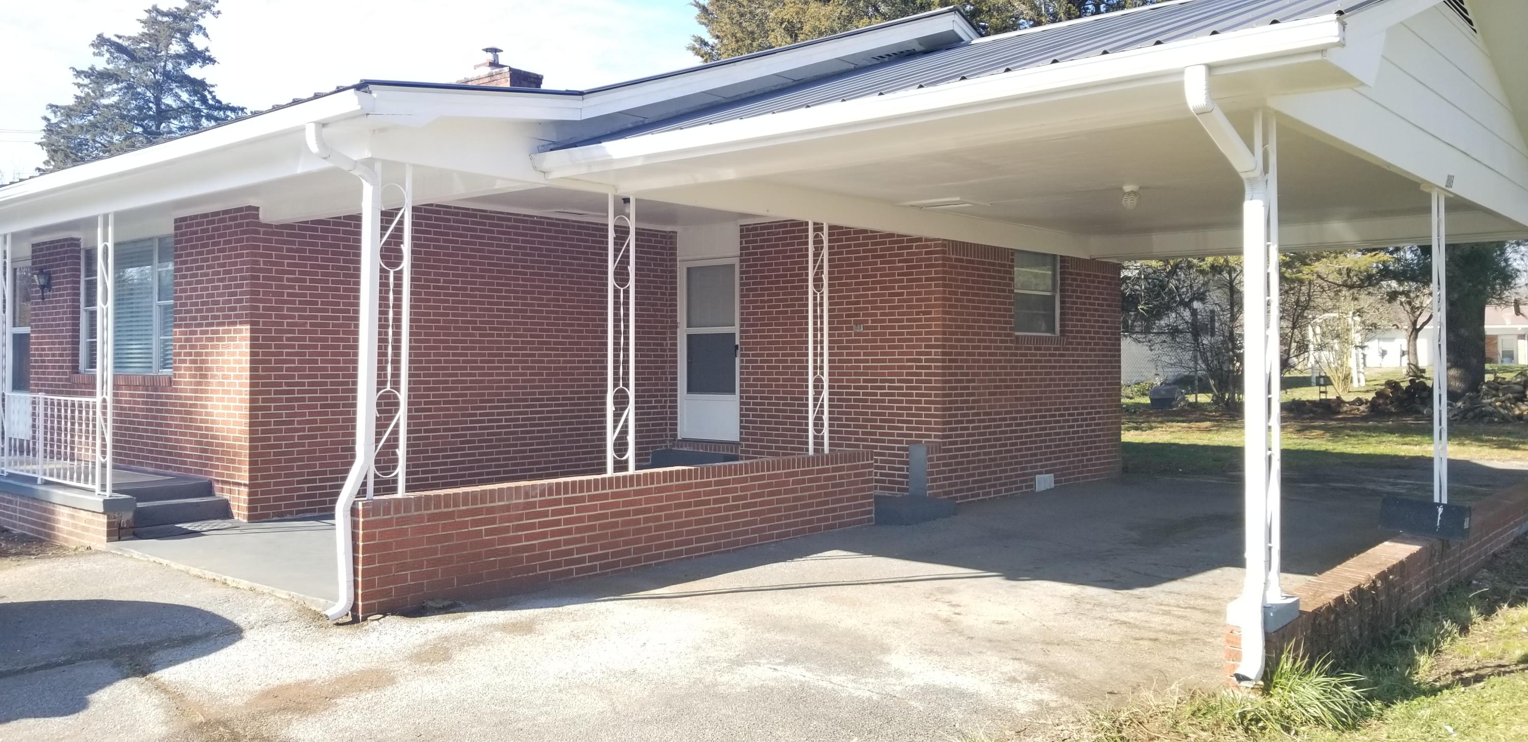203 Russell Road New Tazewell, TN 37825 - Photo 7 of 32 Carport