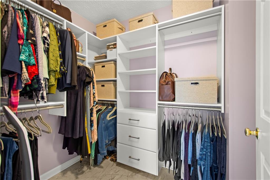 602 Birch Court Bridgeville, PA 15017 - Photo 26 of 47 a view of walk in closet with clothes and shoes
