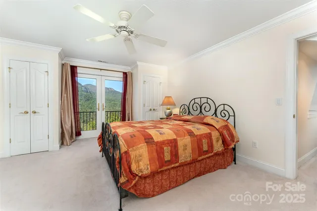 a spacious bedroom with a bed and window