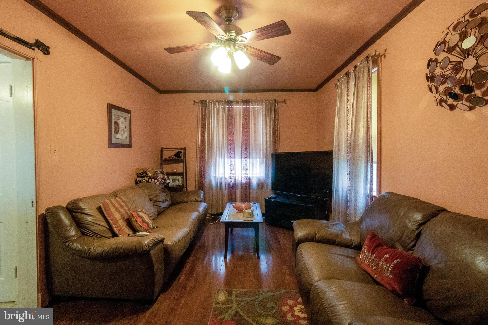 4018 Deepwood Road Baltimore, MD 21218 - Photo 15 of 35 1st lvl fam rm w/ 1/2 bath & closet could be BR