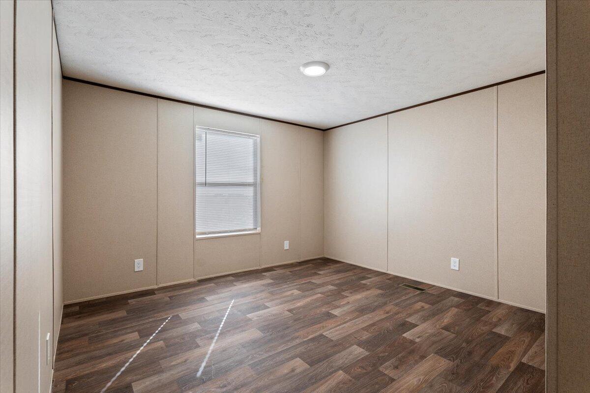 508 Sage Road Tahoka, TX 79373 - Photo 17 of 26 a view of an empty room with a window