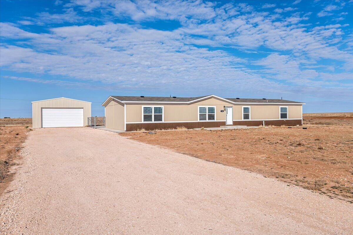 508 Sage Road Tahoka, TX 79373 - Photo 2 of 26 a house view with a outdoor space