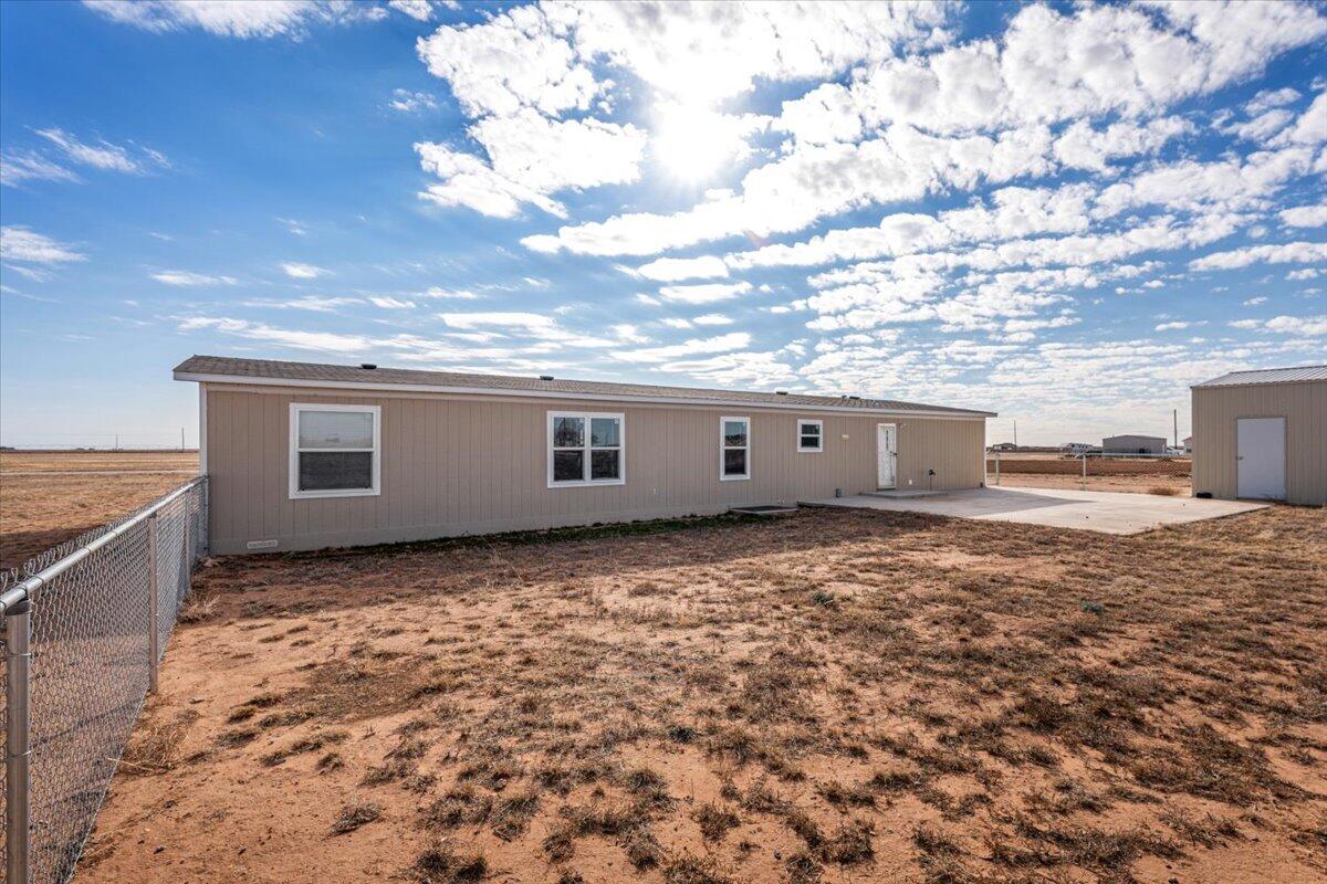 508 Sage Road Tahoka, TX 79373 - Photo 24 of 26 a view of a back yard of the house