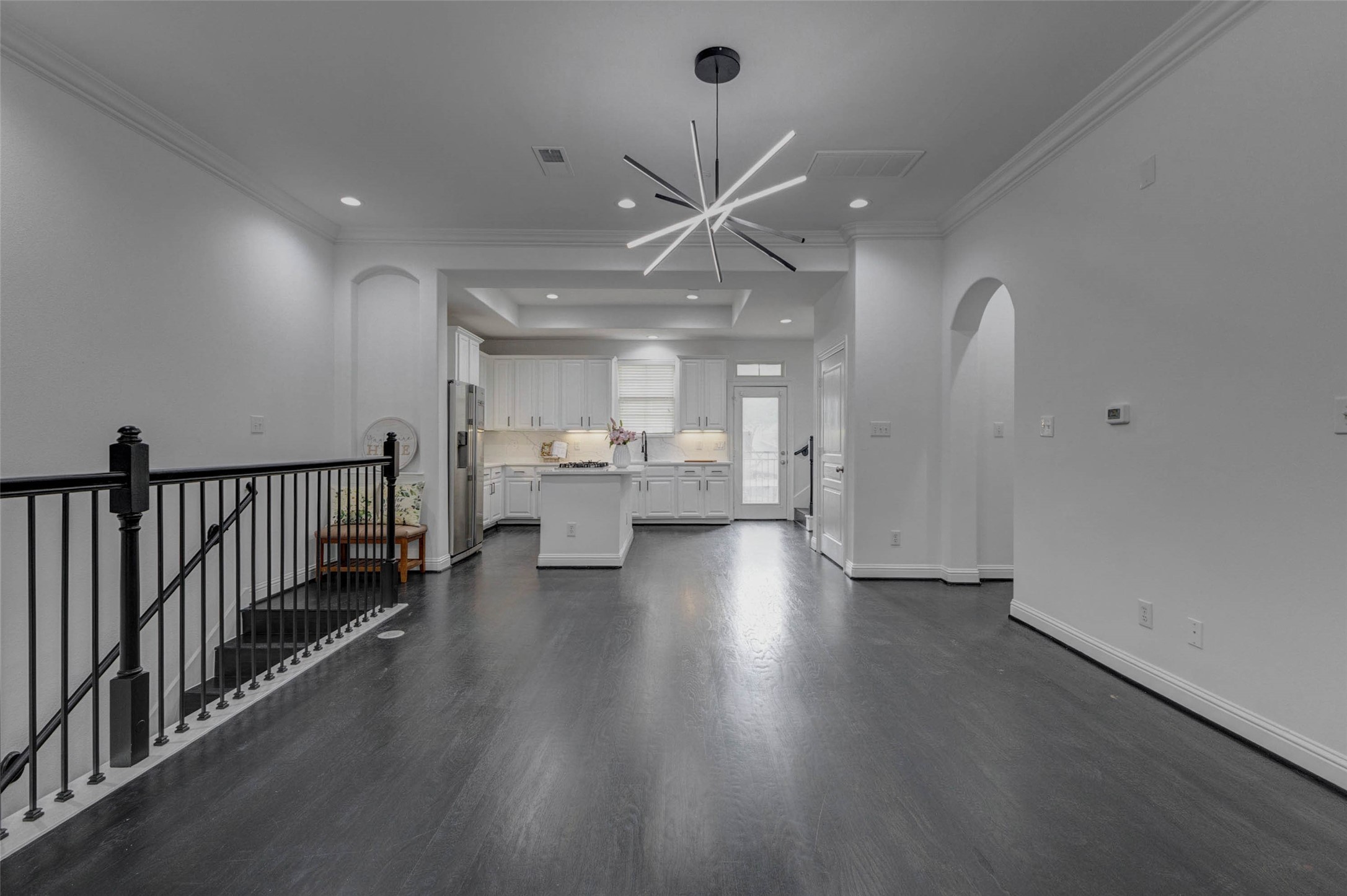19 Versante Court Houston, TX 77070 - Photo 12 of 40 You'll never miss a moment of action in this open concept layout!