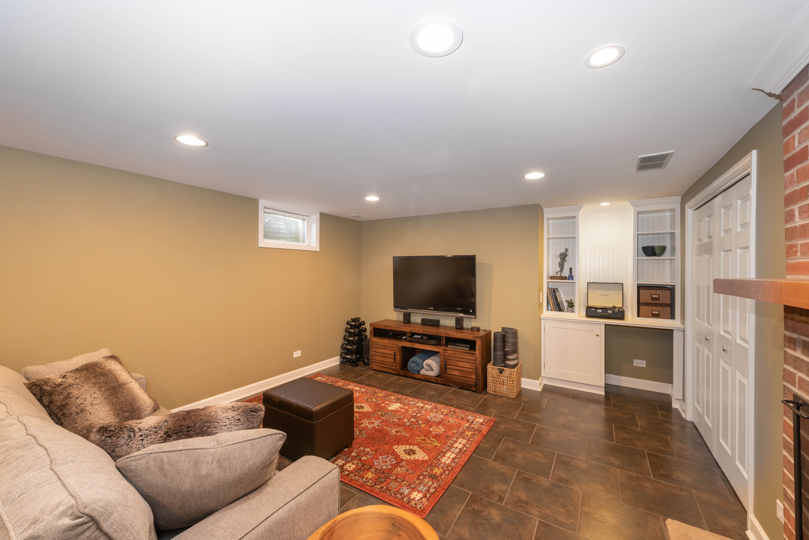 36W231 Crane Road St. Charles, IL 60174 - Photo 21 of 29 a living room with furniture and a flat screen tv