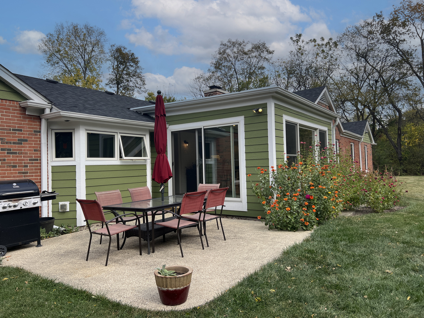 36W231 Crane Road St. Charles, IL 60174 - Photo 25 of 29 a backyard of a house with table and chairs