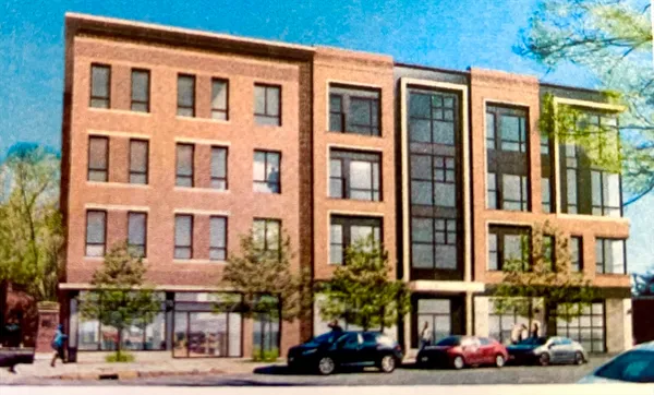 a front view of a building with street view