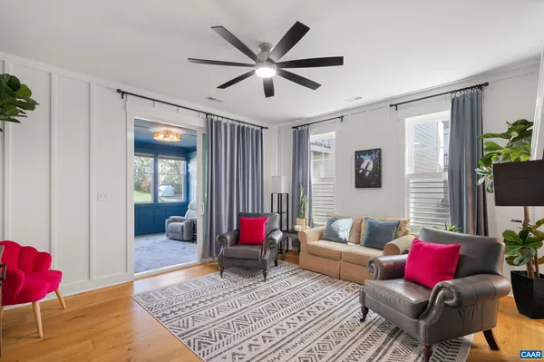 a living room with furniture or couch and a rug