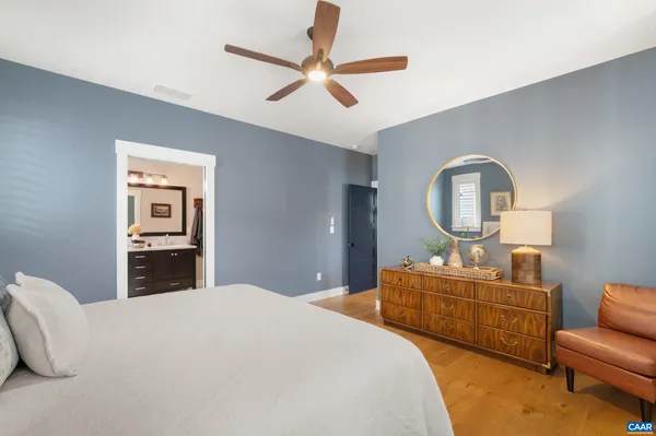 a bedroom with bed and window