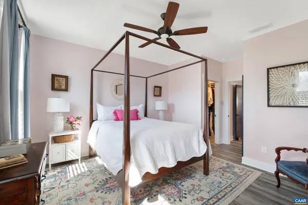 a bed room with a bed and a window