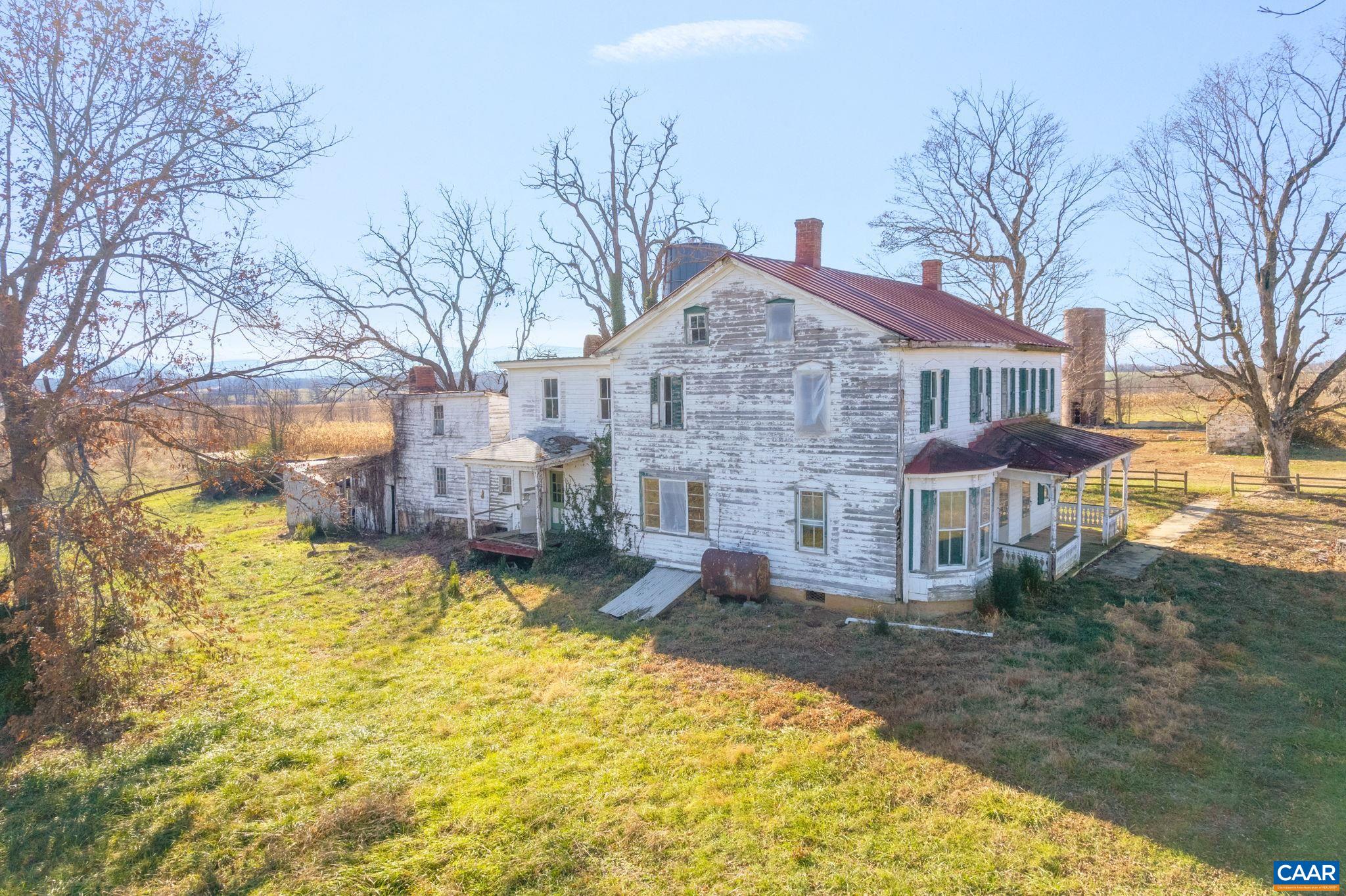 389 Shalom Road Waynesboro, VA 22980 - Photo 4 of 21 a view of a house with a yard covered with snow