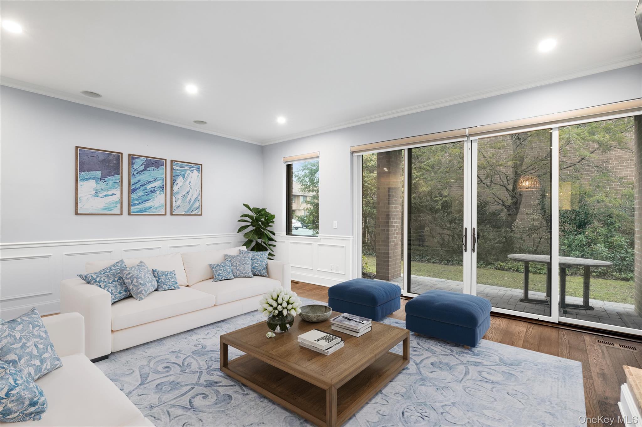 36 Waters Edge Rye, NY 10580 - Photo 7 of 30 Living room with sliding glass doors to private patio