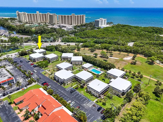 a view of a house with pool and outdoor space