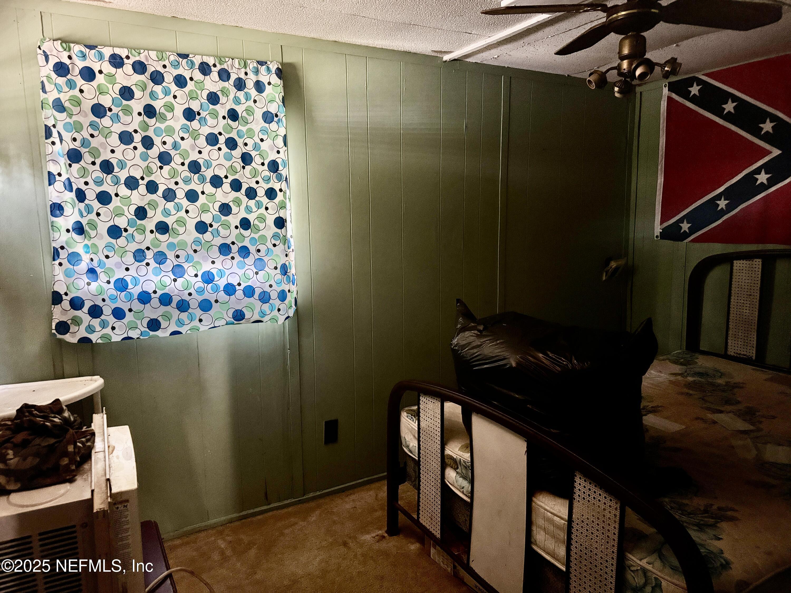 267 Lakeview Court Interlachen, FL 32148 - Photo 10 of 10 a bathroom with a sink and a mirror