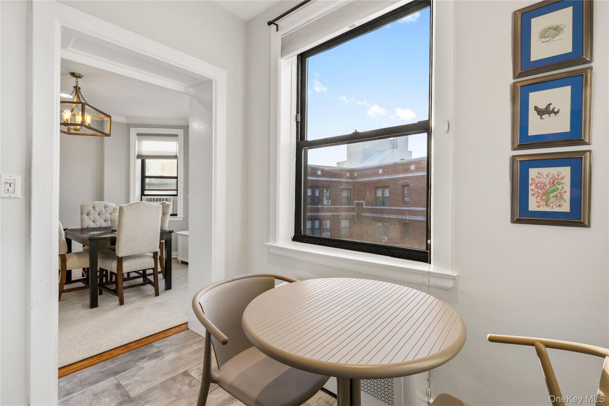 11 Alden Road, Unit 6L Larchmont, NY 10538 - Photo 12 of 22 a view of a livingroom with furniture and a window