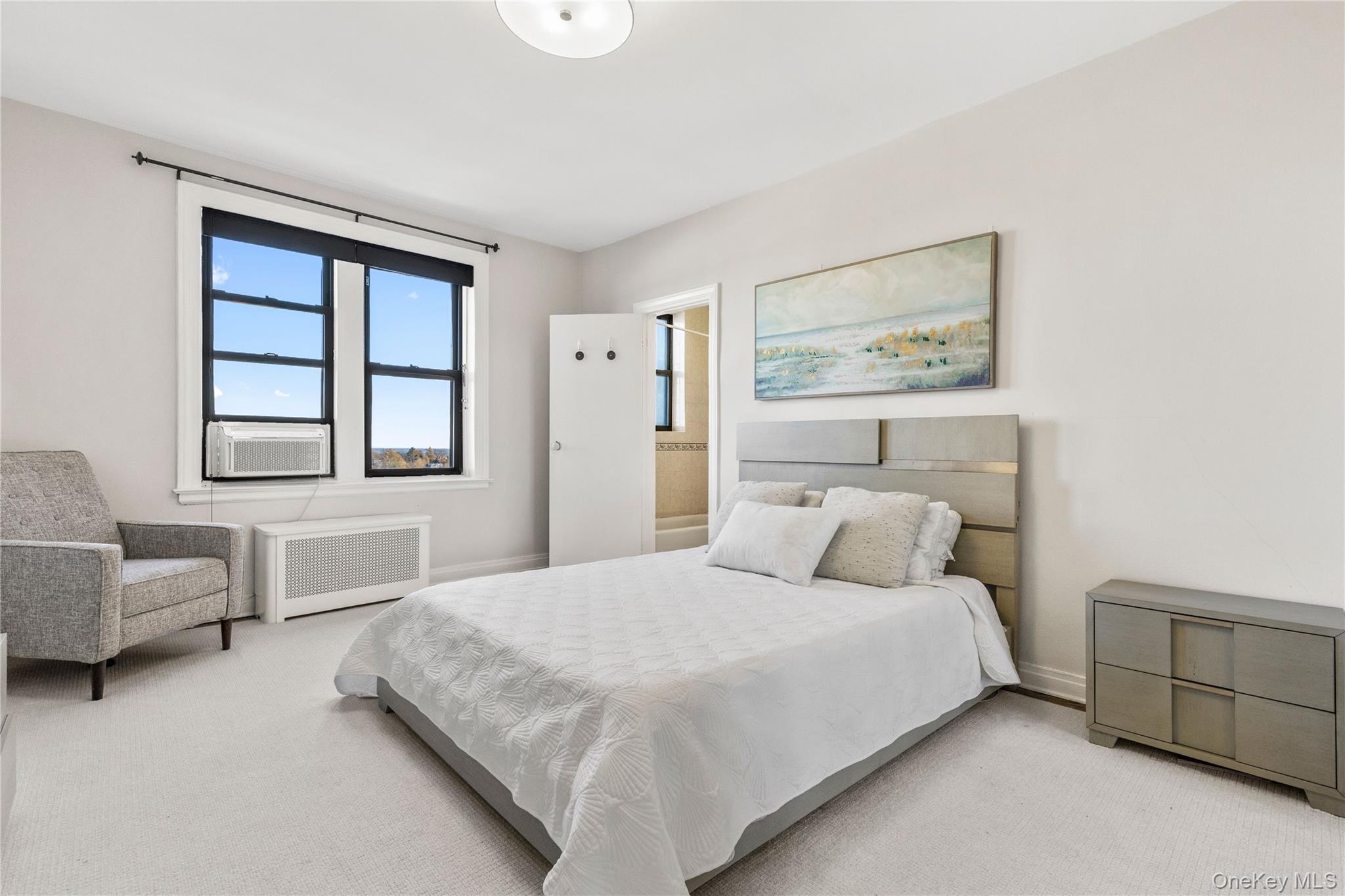 11 Alden Road, Unit 6L Larchmont, NY 10538 - Photo 15 of 22 a bedroom with a bed couch and window