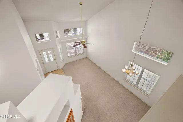 a view of livingroom with furniture and window