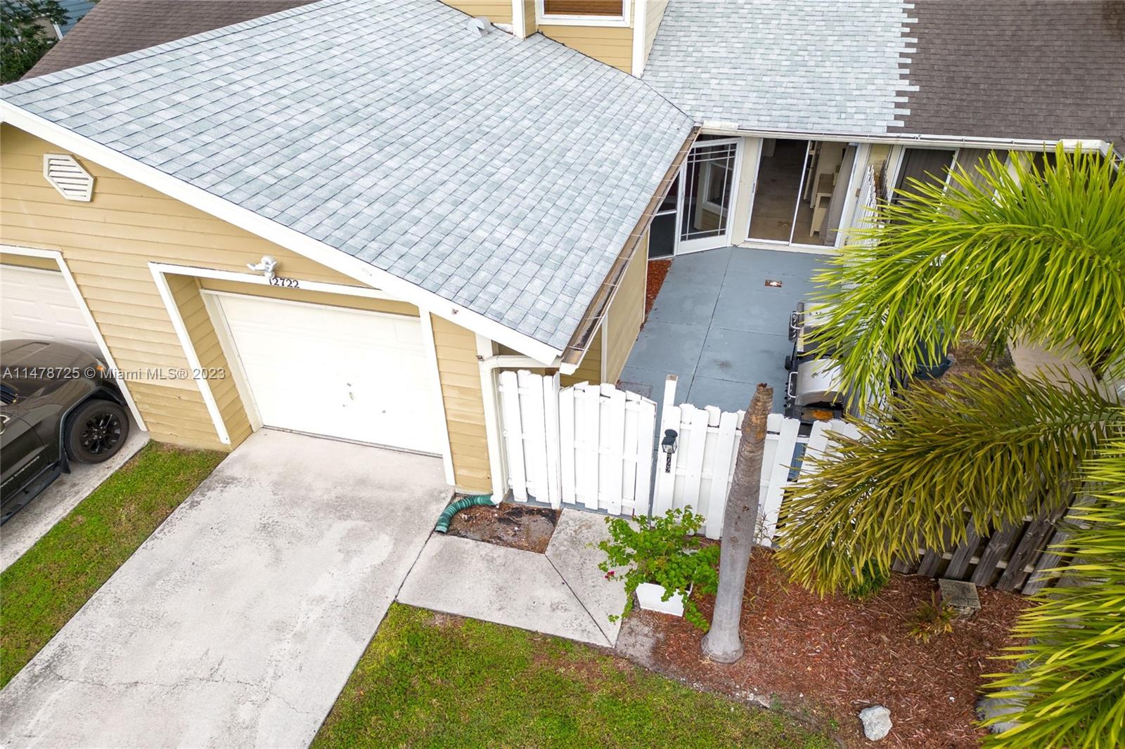 12722 Westhampton Circle Wellington, FL 33414 - Photo 4 of 52 a view of a back yard of the house