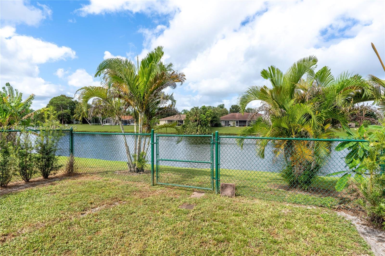12722 Westhampton Circle Wellington, FL 33414 - Photo 41 of 52 a view of a garden