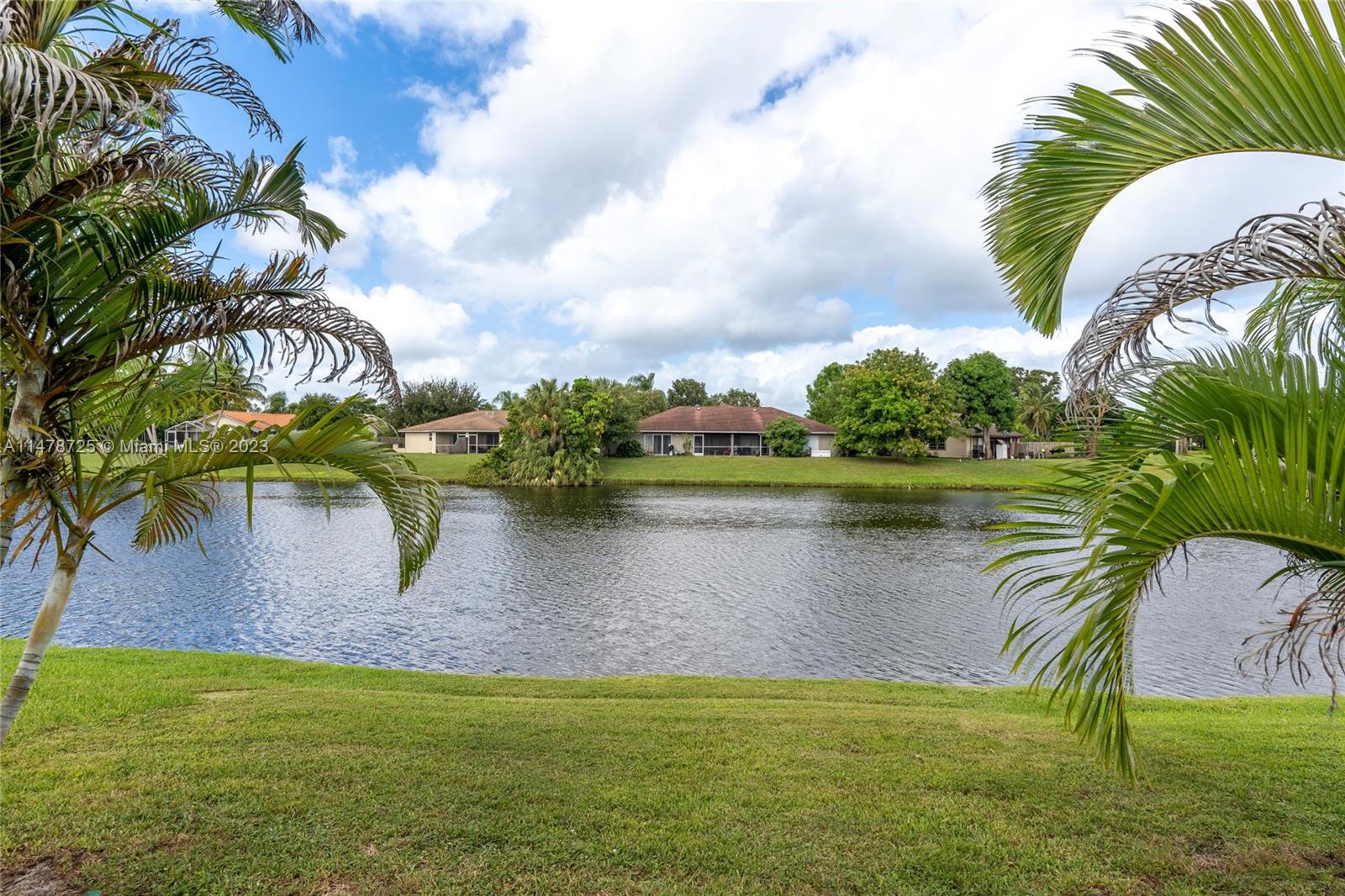 12722 Westhampton Circle Wellington, FL 33414 - Photo 42 of 52 a view of a lake view