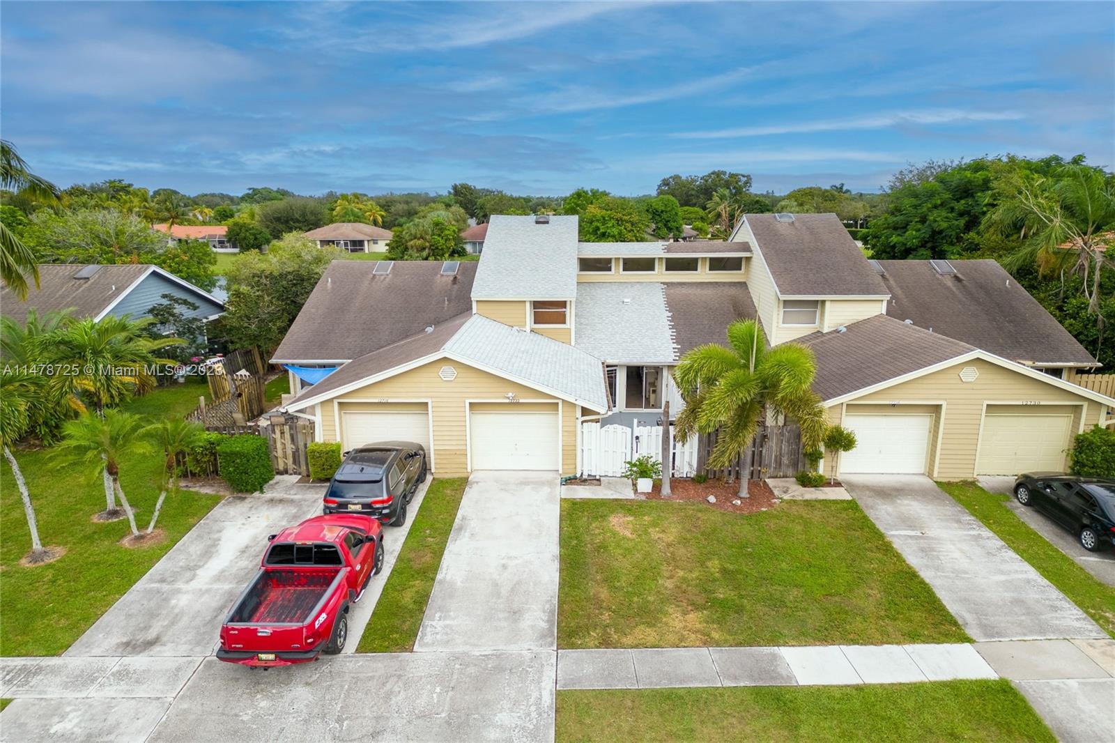 12722 Westhampton Circle Wellington, FL 33414 - Photo 5 of 52 an aerial view of a house