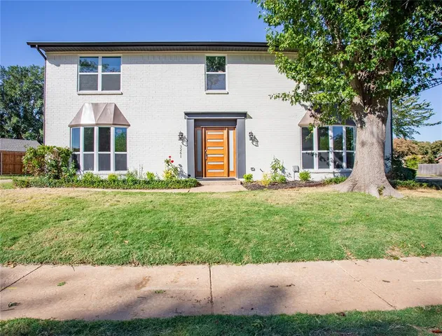 a front view of house with yard
