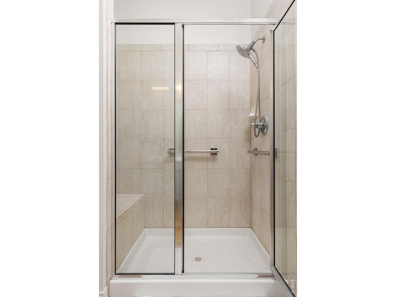 636 Wild Ridge Circle Lafayette, CO 80026 - Photo 19 of 40 Primary bath walk-in shower