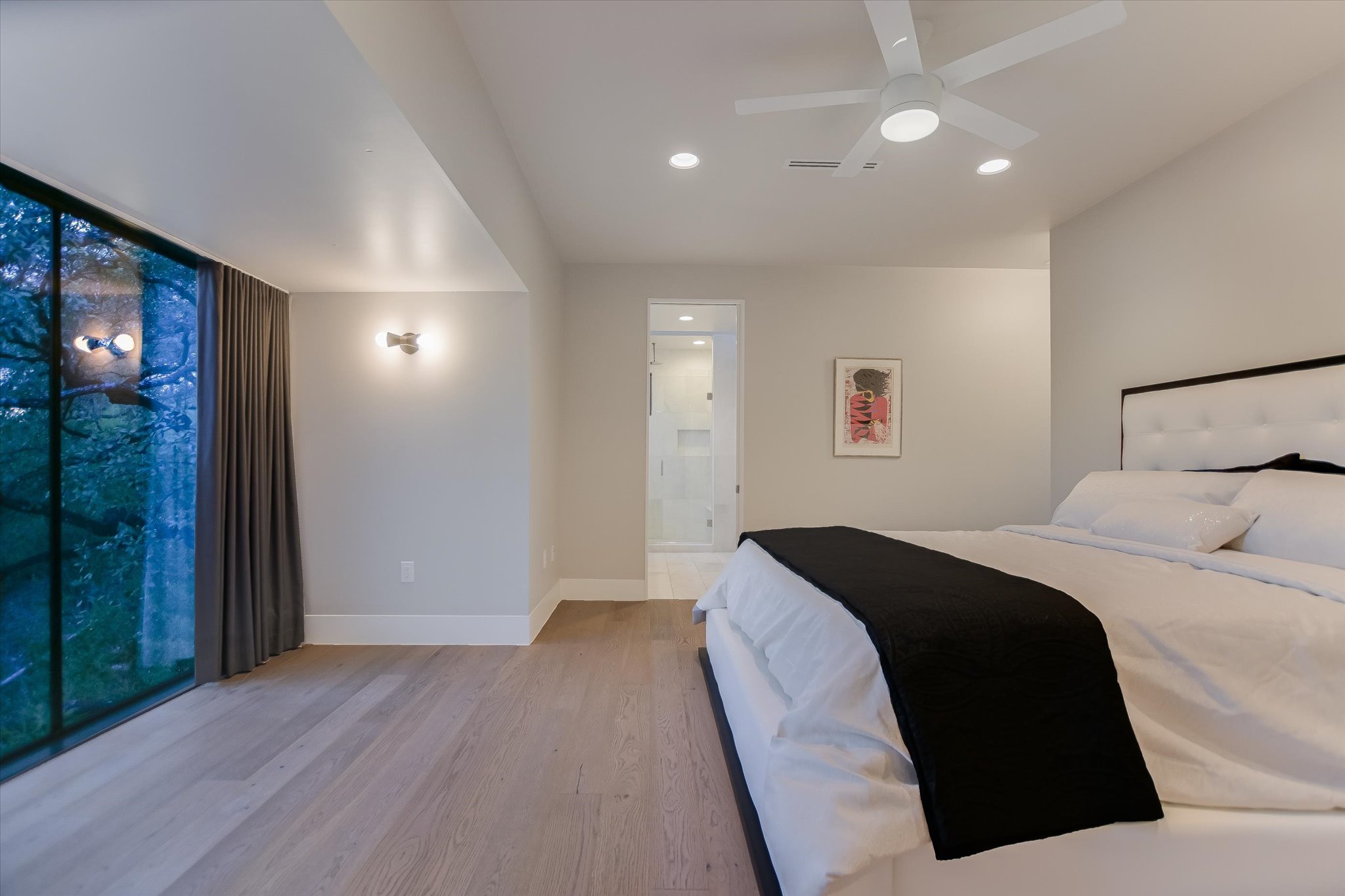 1325 Bonham Terrace, Unit A Austin, TX 78704 - Photo 15 of 25 a bedroom with a bed and a mirror