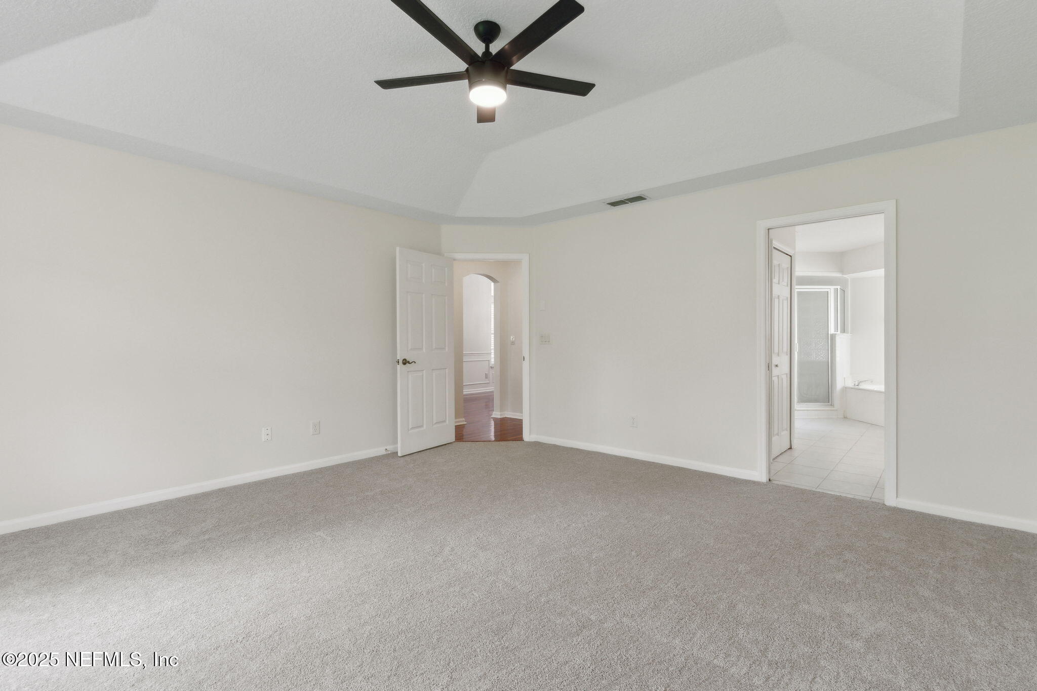 1912 Bluebonnet Way Fleming Island, FL 32003 - Photo 18 of 41 Primary Bedroom Door View