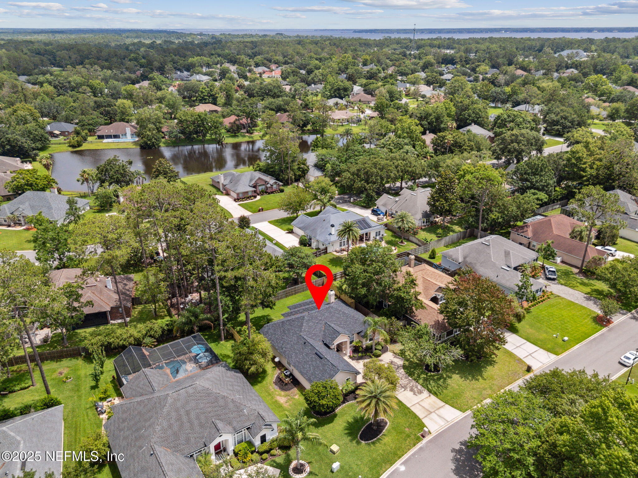 1912 Bluebonnet Way Fleming Island, FL 32003 - Photo 28 of 41 an aerial view of residential houses with outdoor space and trees