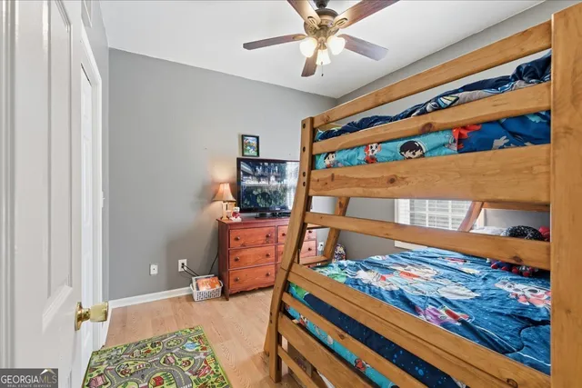 a bedroom with bunk bed