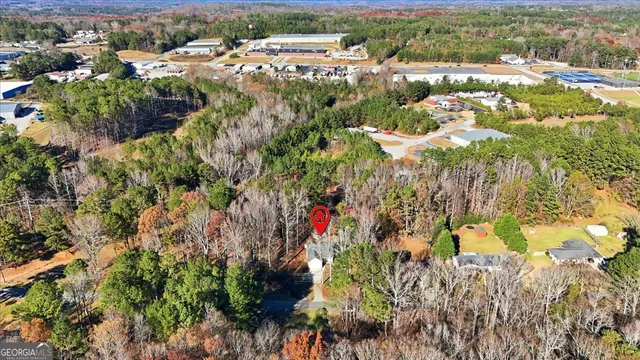 a view of a swimming pool with a yard and mountain view