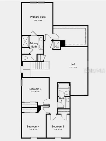 a kitchen with a table chairs microwave and cabinets