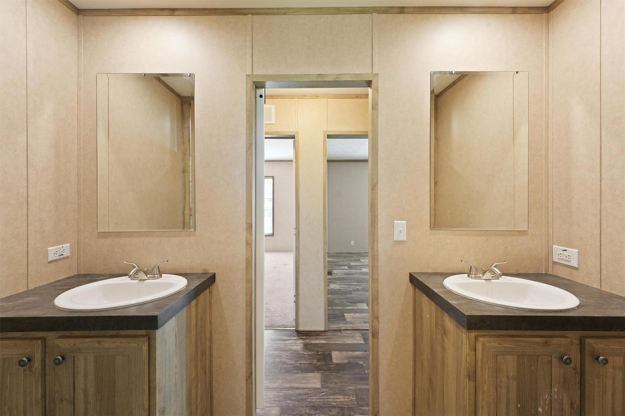 11744 Padok Road Houston, TX 77044 - Photo 14 of 21 a bathroom with a sink and a mirror