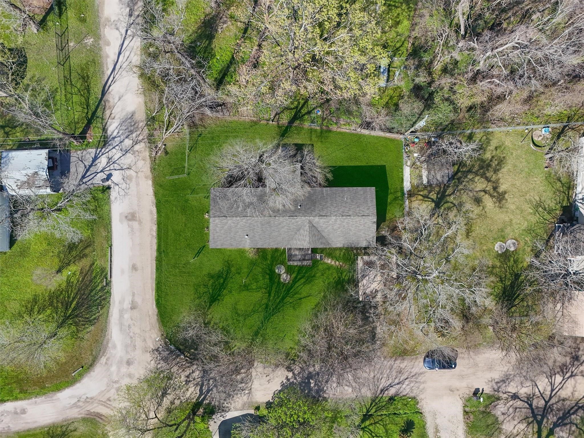 11744 Padok Road Houston, TX 77044 - Photo 20 of 21 an aerial view of a house with a yard
