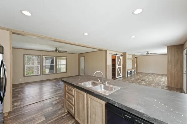 a bathroom with sinks and a large mirror