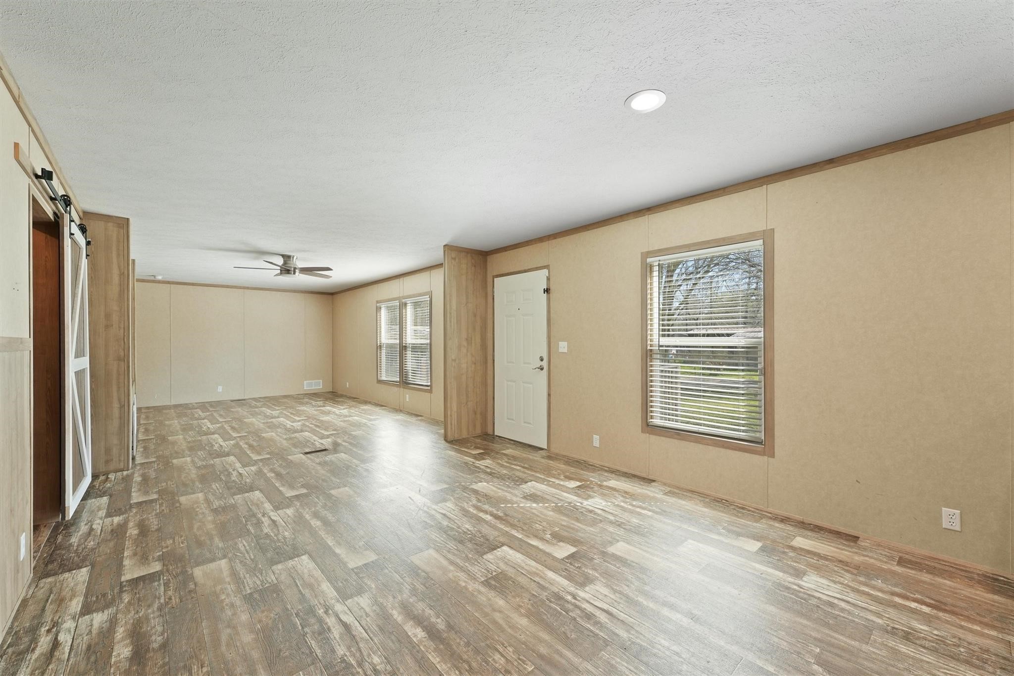 11744 Padok Road Houston, TX 77044 - Photo 9 of 21 a view of an empty room with a window