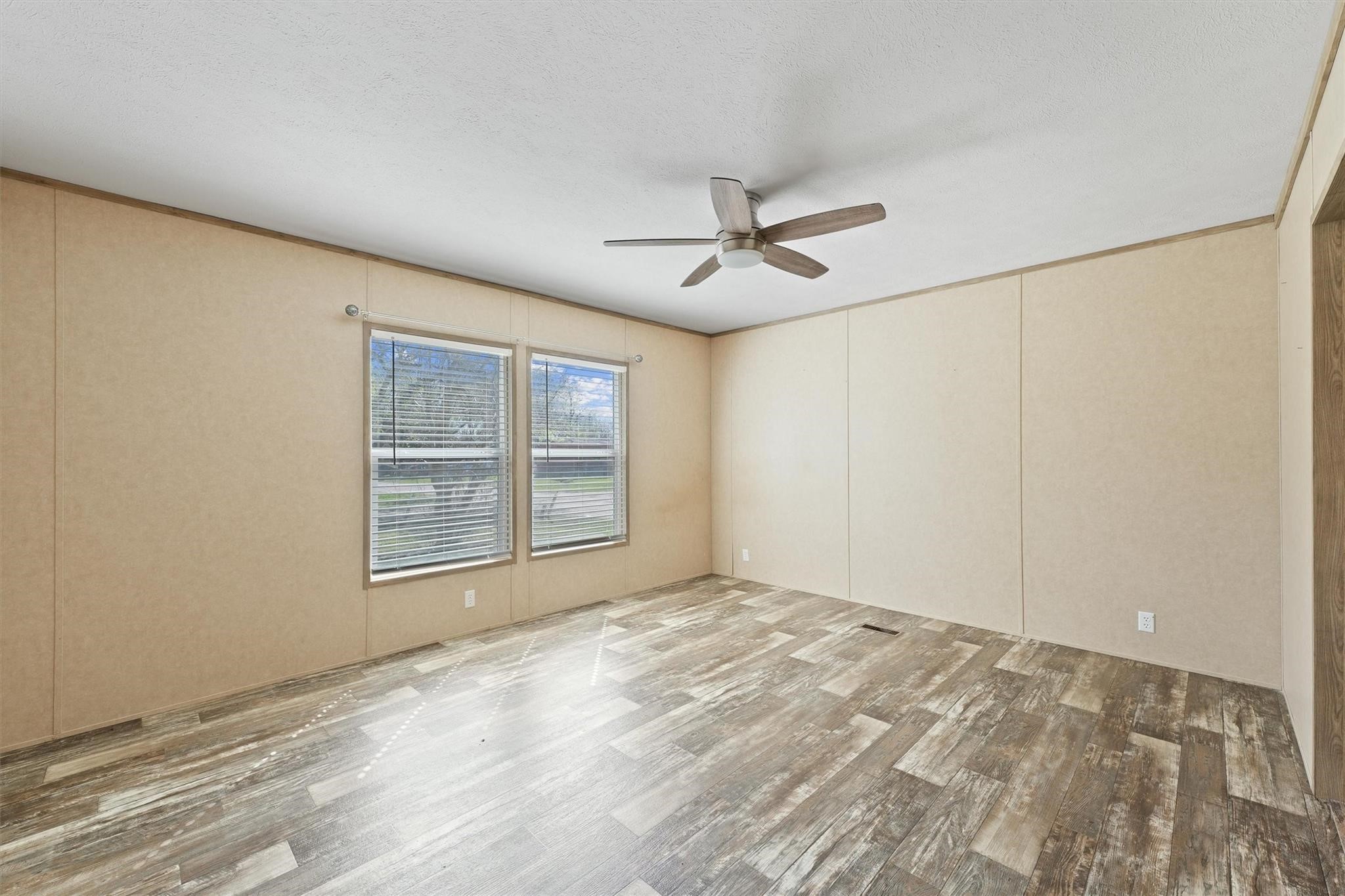 11744 Padok Road Houston, TX 77044 - Photo 10 of 21 a view of an empty room with a window
