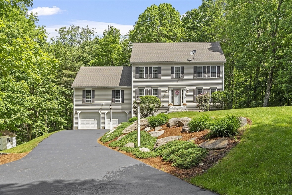34 Ball Hill Road Princeton, MA 01541 - Photo 1 of 37 front view of a house with a yard