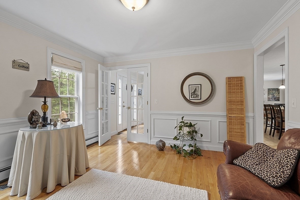 34 Ball Hill Road Princeton, MA 01541 - Photo 14 of 37 a living room with furniture and a mirror