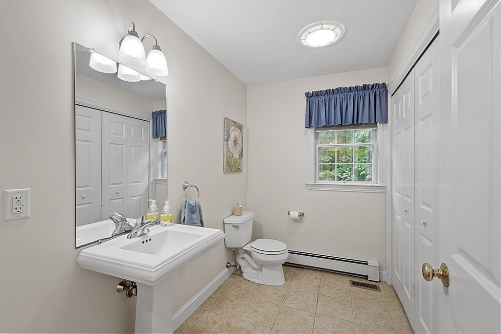 34 Ball Hill Road Princeton, MA 01541 - Photo 16 of 37 a bathroom with a sink toilet and a mirror