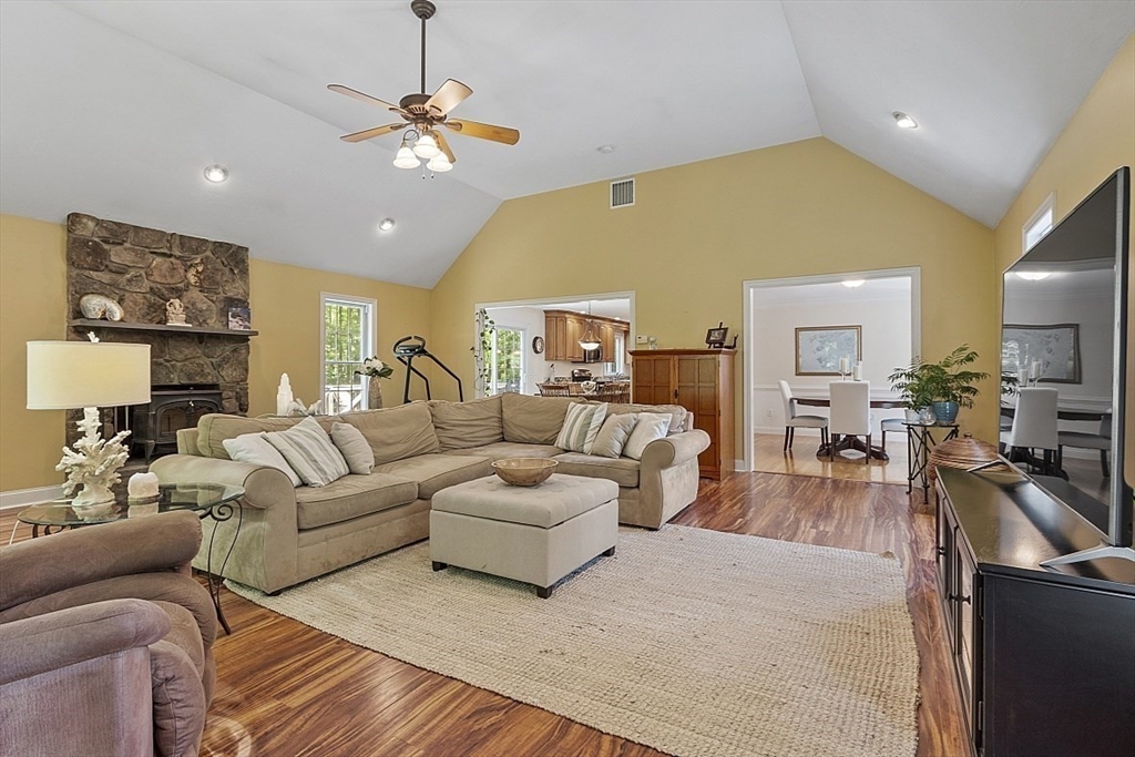 34 Ball Hill Road Princeton, MA 01541 - Photo 3 of 37 a living room with furniture and a chandelier
