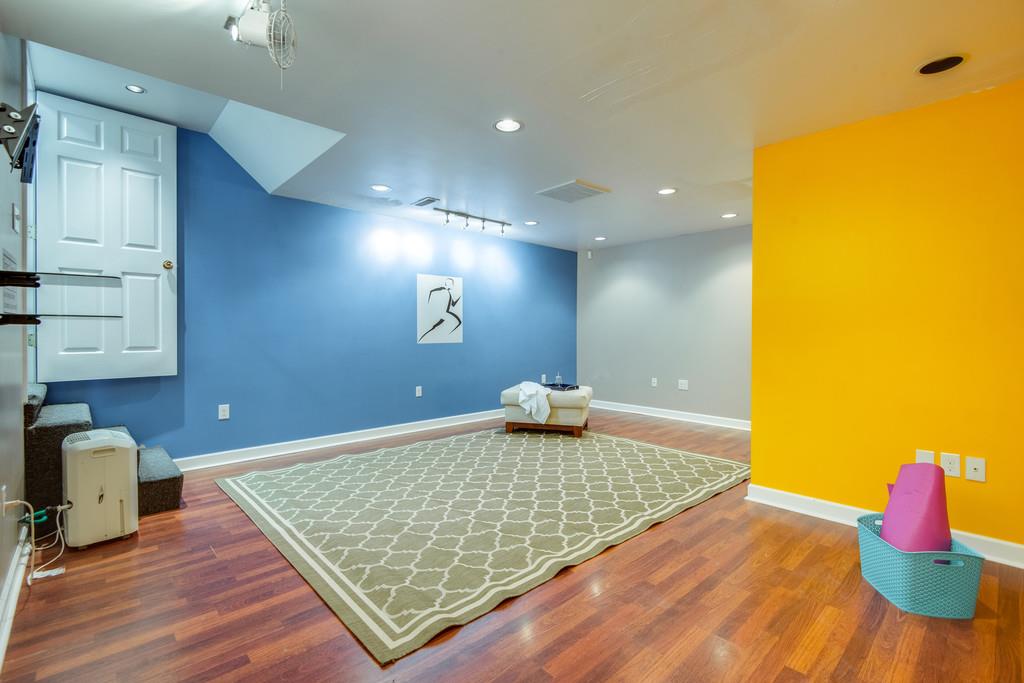 419 Buddy Road Burns, TN 37029 - Photo 25 of 30 FULL BASEMENT w/ Full Bath--Perfect for In-Law Suite, Home Office--Current owner used as YOGA/HOME GYM SPACE!