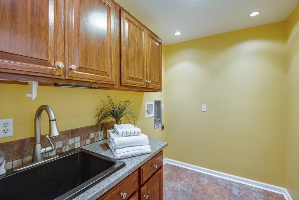 419 Buddy Road Burns, TN 37029 - Photo 26 of 30 Custom Cabinets, Wet Sink in Laundry Room